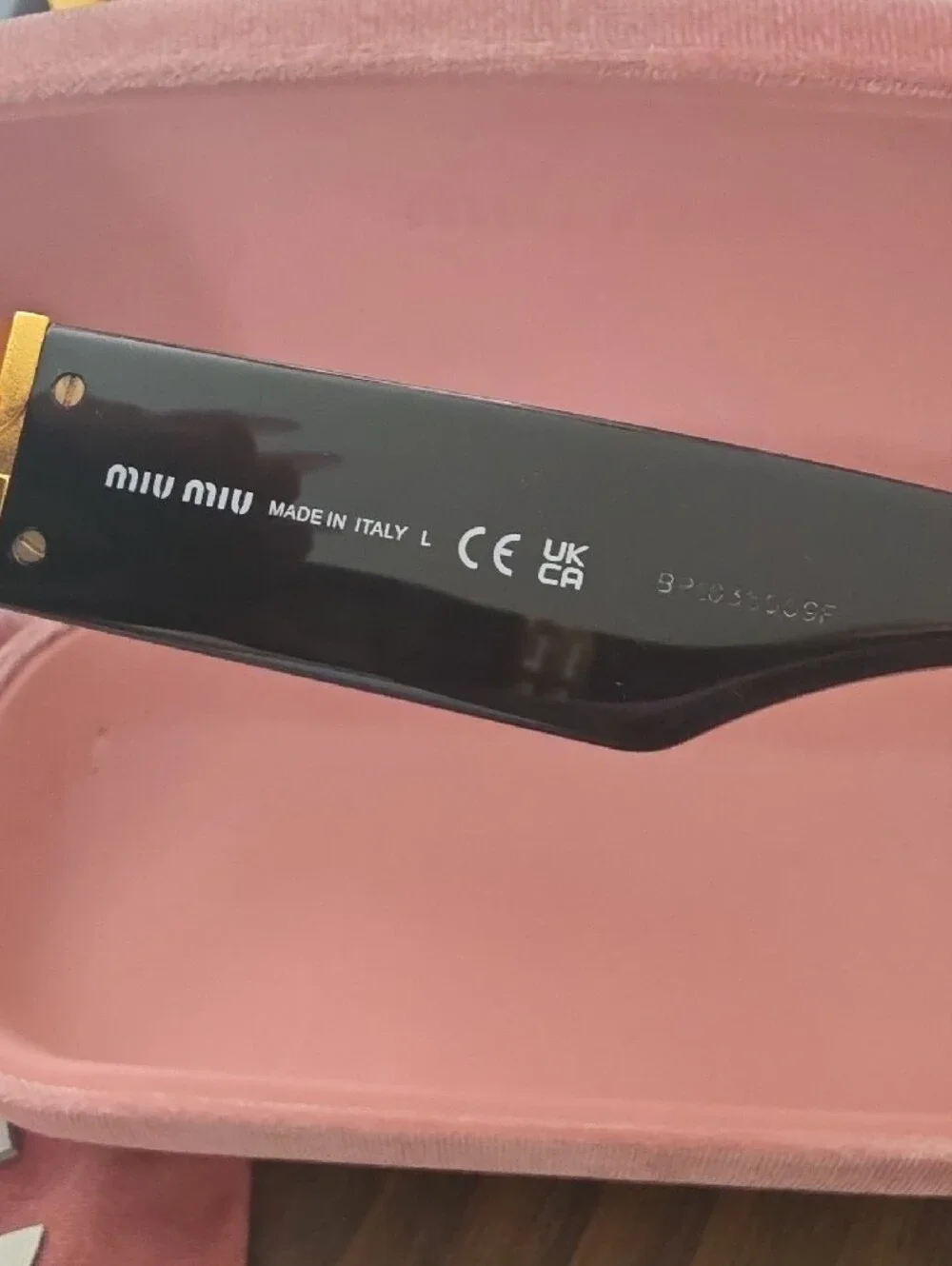 Miu Miu Glossy Black Cat-Eye Sunglasses with Pink Velvet Case